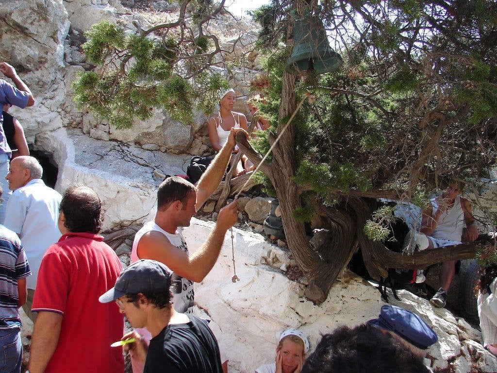 Herakleia, Festival of St. John the Baptist - Gastronomy Tours man rings the bell at the Church of St. John the Baptist commemorate festival of her birth at Herakleia, Greece